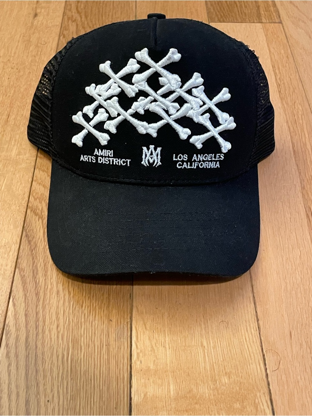 AMIRI Black Trucker Hat with White Embroidered Bone Motif